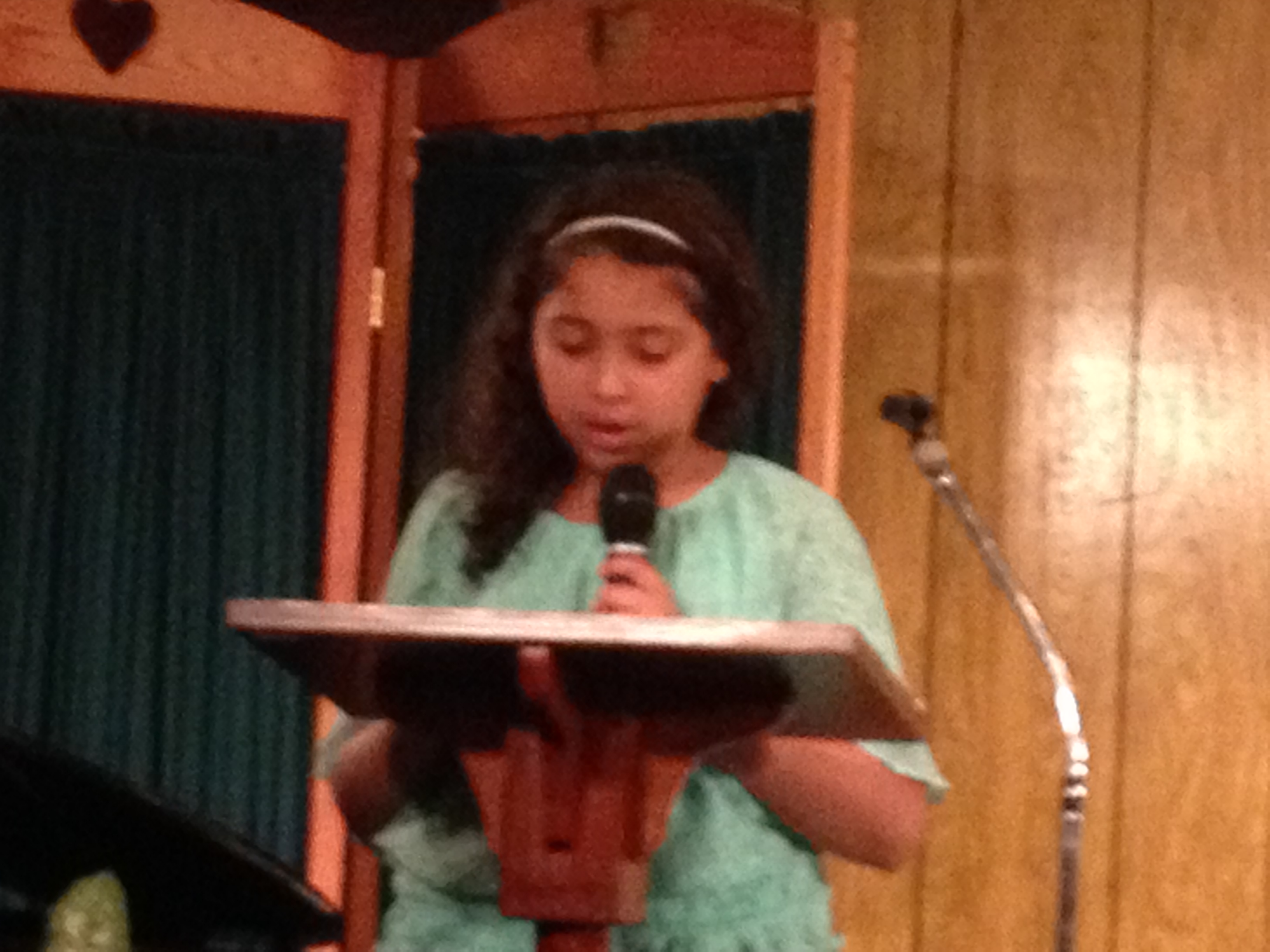 Hailey Phillips reading the Christmas story